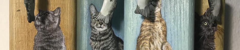 Katzen mit Fischen